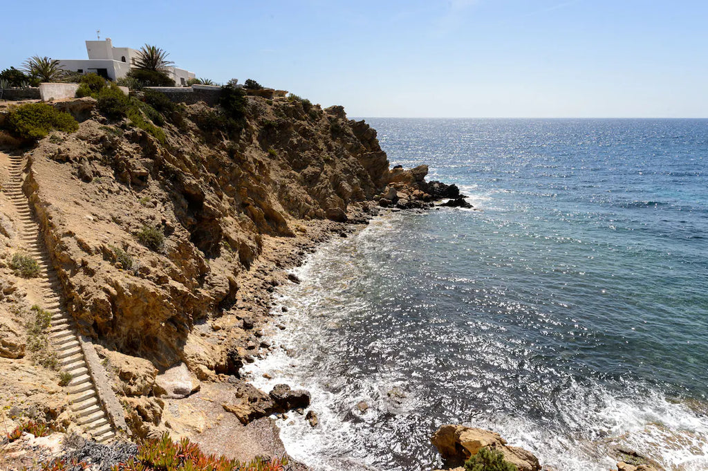 Super Rare 8-Bedroom Luxury Seafront Ibiza Villa with Private Beach, Panoramic Rooftop and Underground DJ Room in Santa Eulalia