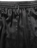 Dolce & Gabbana Lace-Trimmed Satin Skirt — Black