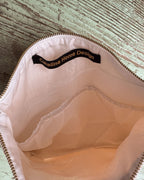 Bolsa de rayas blanco y rosa