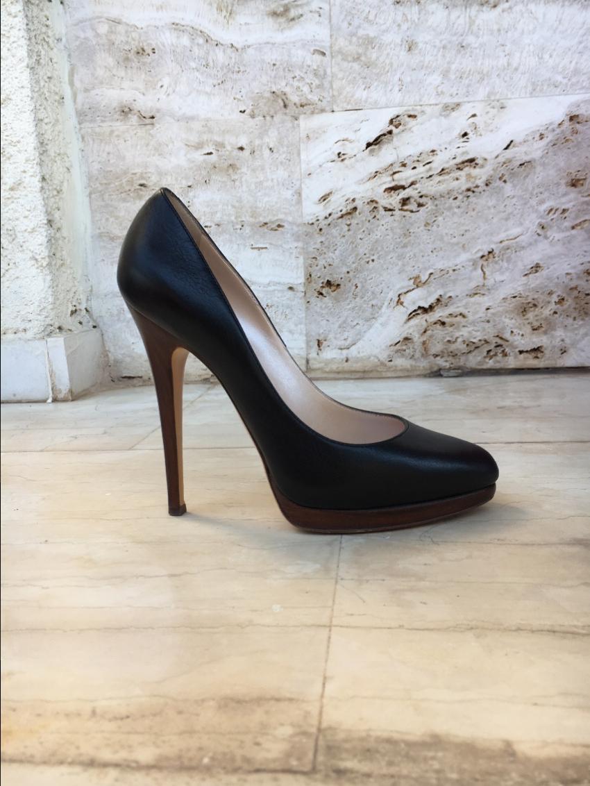 Casadei black leather pumps