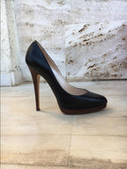 Casadei black leather pumps