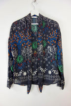 Black zodiac print crepe lavaliere blouse