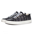 Black & white tweed low top trainers