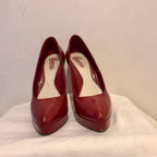 Red patent leather platform heeled pumps
