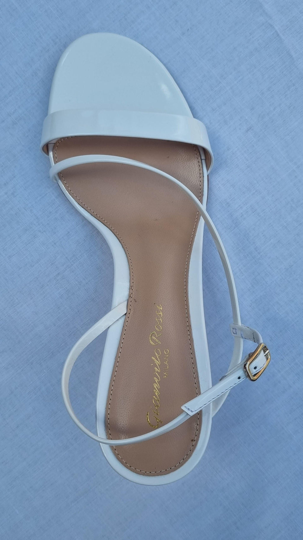 White patent leather strapped heeled sandals