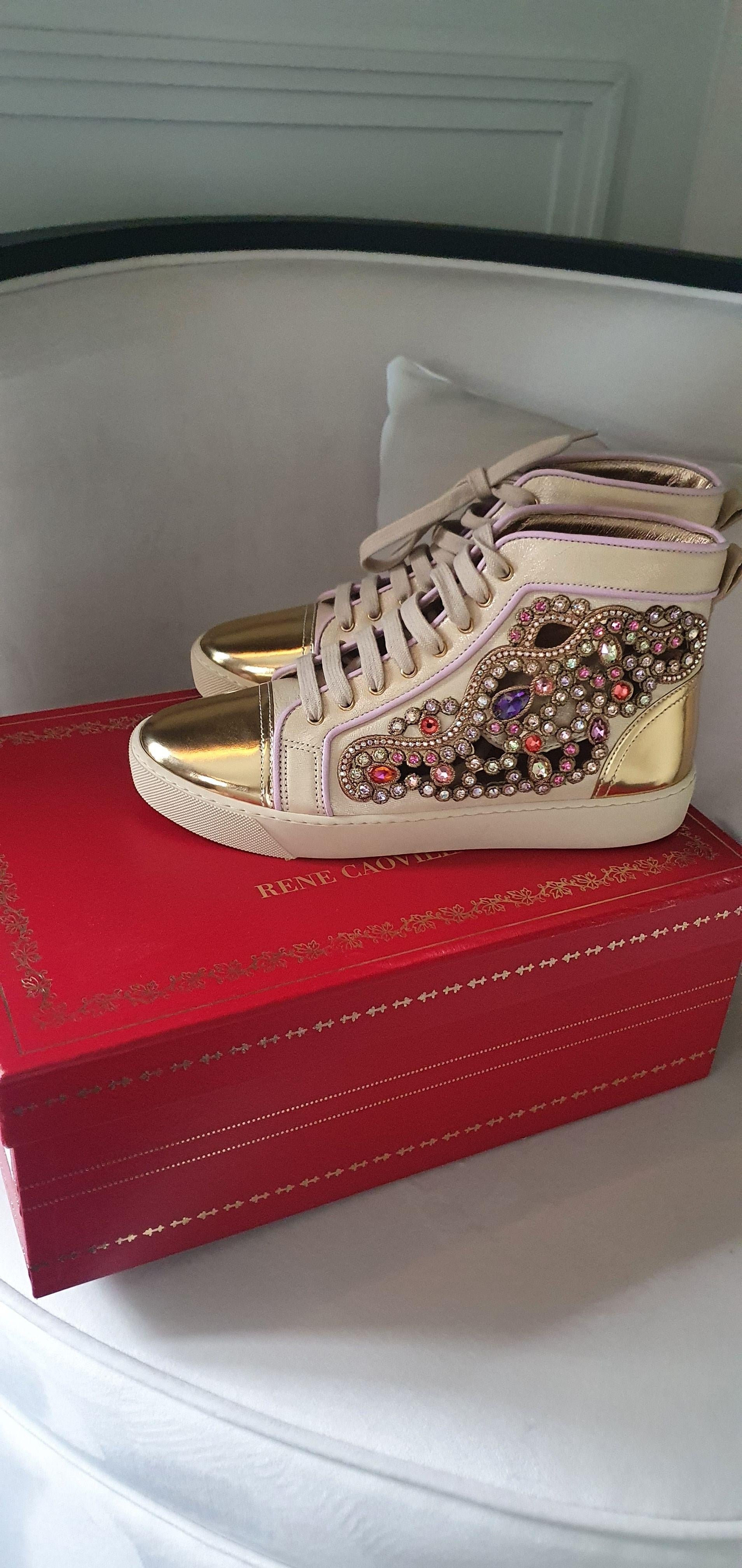 Metallic gold leather & crystal cut-out trainers