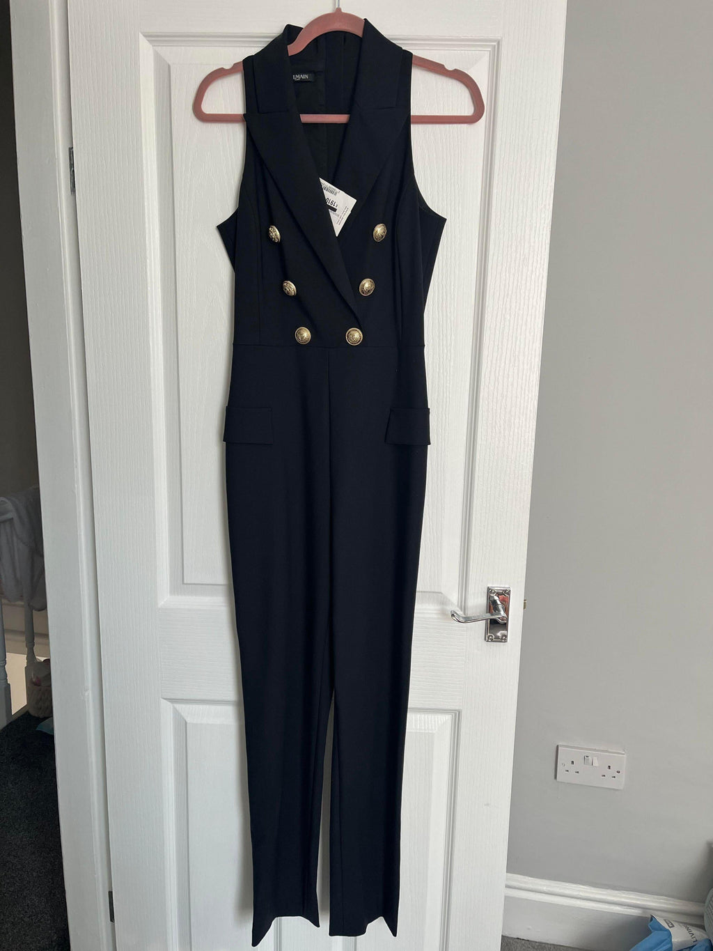 sleeveless double breasted jumpsuit