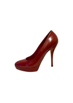 Red patent leather platform heeled pumps