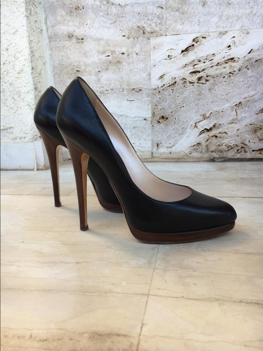 Casadei black leather pumps
