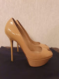 Nude patent leather Cachet platform heeled pumps