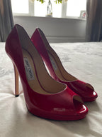 Red patent Luna heeled pumps
