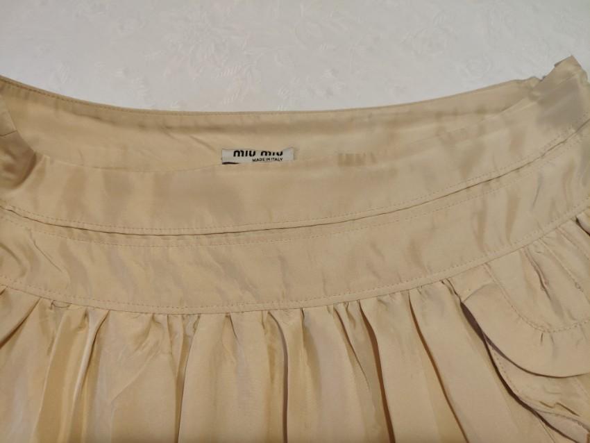 Miu Miu beige pleated mini skirt