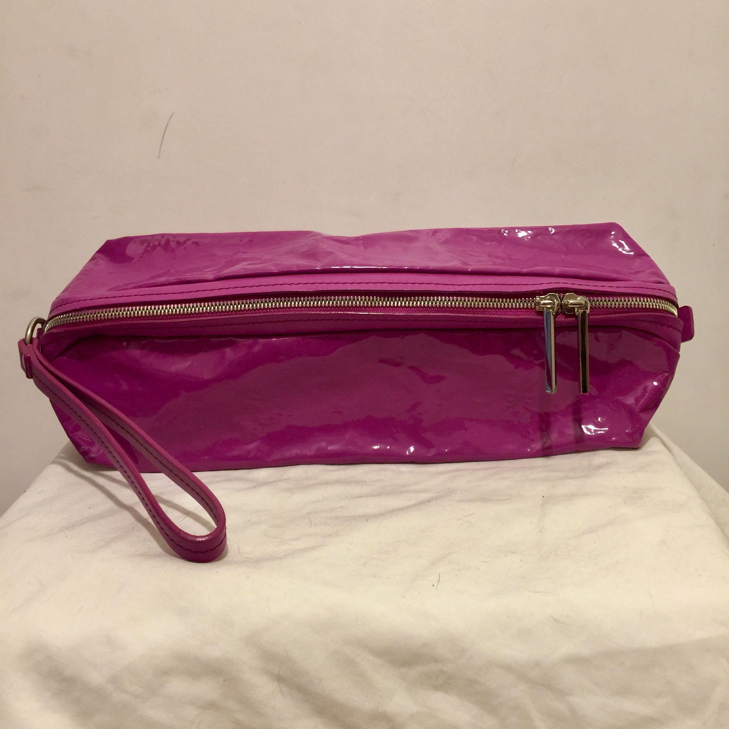 Fuchsia vinyl & leather clutch bag