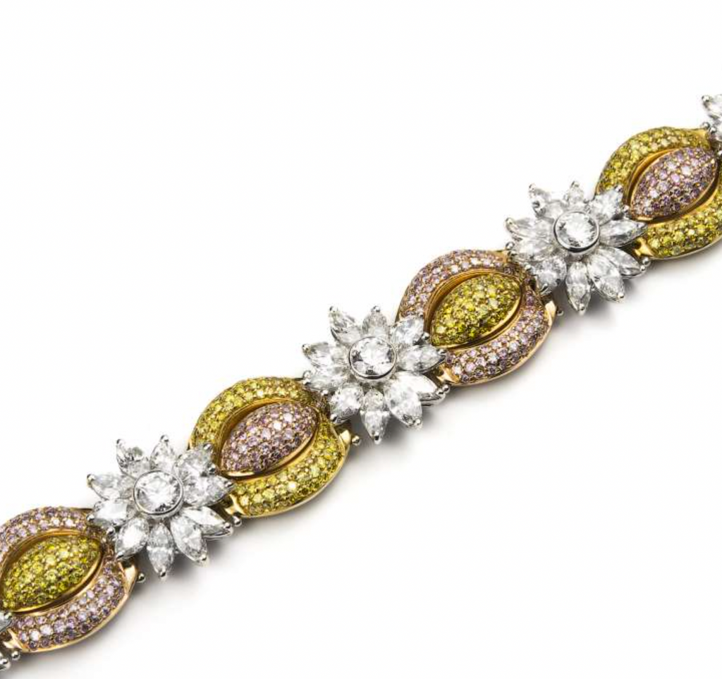 18ct white gold, white, yellow & pink fancy diamond bracelet