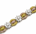 18ct white gold, white, yellow & pink fancy diamond bracelet