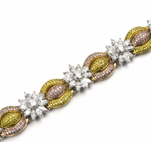 18ct white gold, white, yellow & pink fancy diamond bracelet