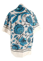 blue/white short sleeve shirt with floral print