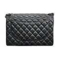 Chanel Black Lambskin Maxi Double Flap Bag