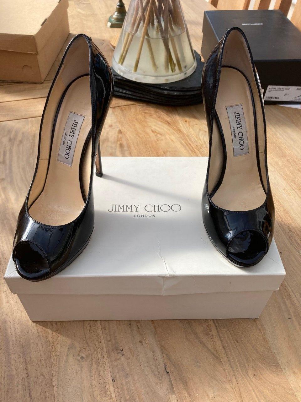 Black patent peep-toe heeled pumps