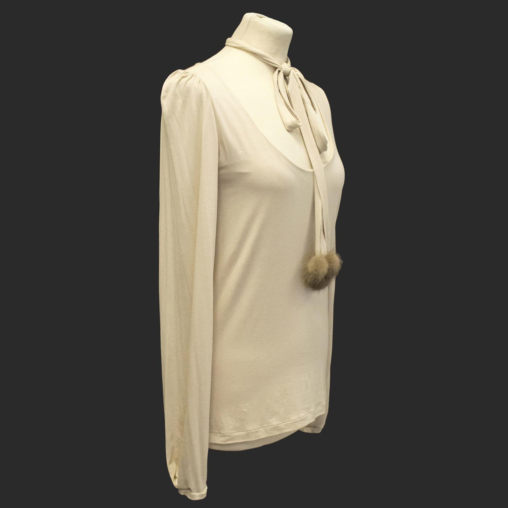 Schumacher beige top with fox fur