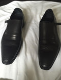 Black perforated leather monk strap shoes