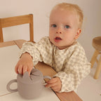 Babero con manga impermeable  Funny Polka Dots Nenina & Co