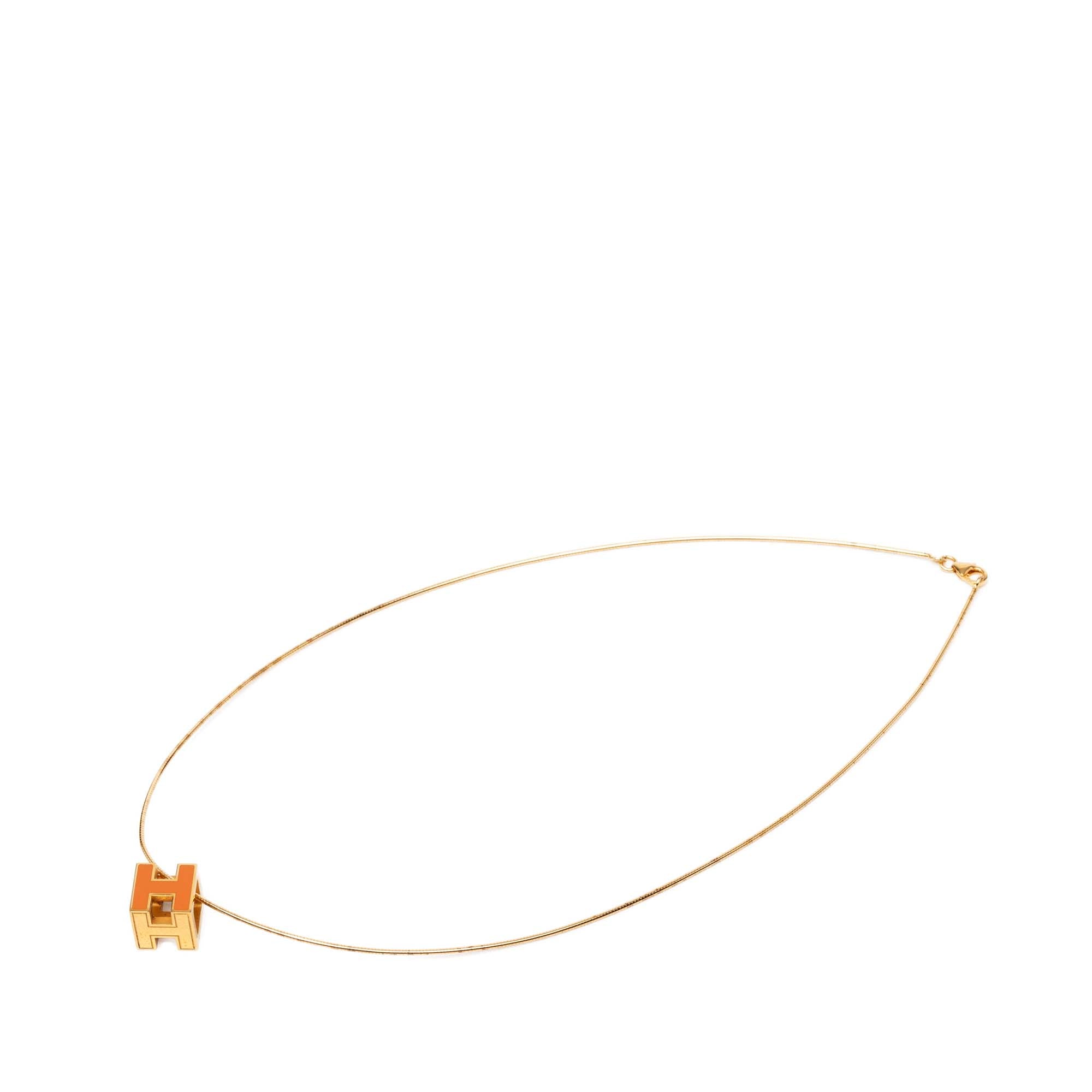 Gold Plated and Enamel Cage d H Pendant Necklace