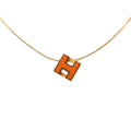 Gold Plated and Enamel Cage d H Pendant Necklace