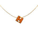 Gold Plated and Enamel Cage d H Pendant Necklace