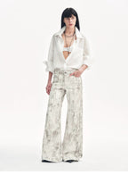 Phantom original snake print flared denim trousers