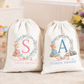 Personalizada Peter Rabbit Bow Wreath Drawstring Bolsa de regalo de lona con nombre e inicial Almacenamiento diario Regalo de Pascua para niños Niñas