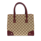 GG Canvas Nailhead Handbag