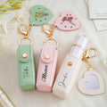 Personalizado Nacimiento Flor PU Cuero Nombre Lápiz Labial Estuche Llavero con forma de corazón Espejo Maquillaje Esenciales Cumpleaños Regalo de boda para las mujeres