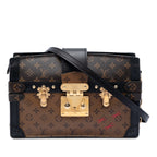 Monogram Reverse Trunk Clutch