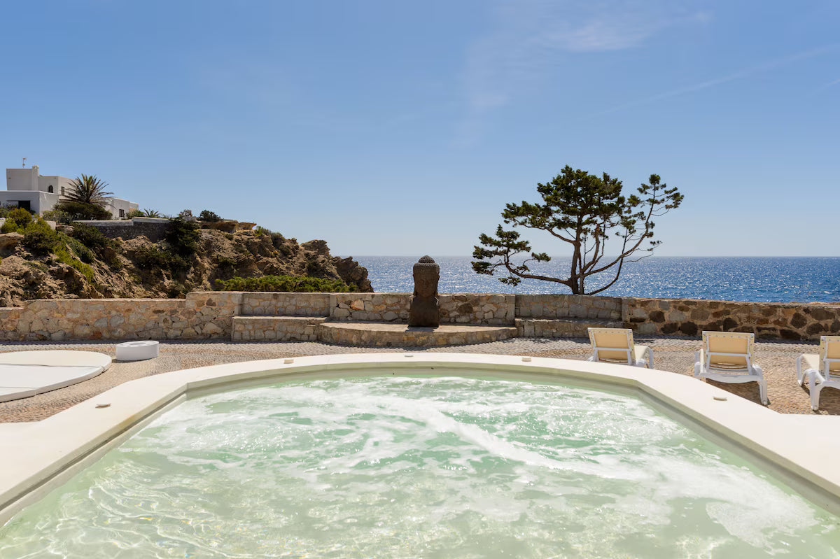 Super Rare 8-Bedroom Luxury Seafront Ibiza Villa with Private Beach, Panoramic Rooftop and Underground DJ Room in Santa Eulalia