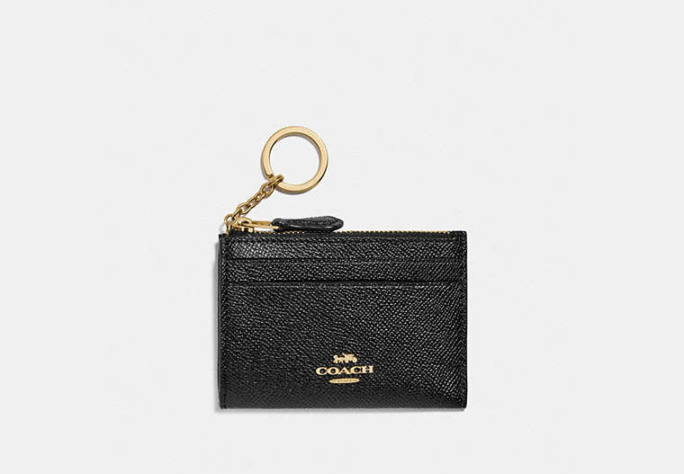COACH® Women's Portadocumentos de identidad Mini Skinny en Negro | Cuir