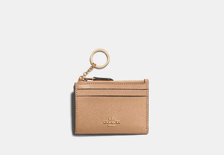 COACH® Women's Portadocumentos de identidad Mini Skinny en Beige | Cuir