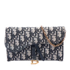 Oblique Canvas Saddle Wallet On Chain