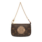 Monogram Trunks and Bags Mini Pochette Accessoires