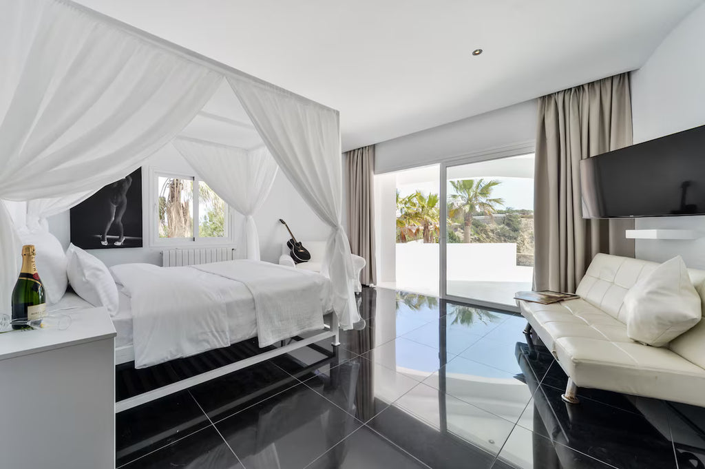 Super Rare 8-Bedroom Luxury Seafront Ibiza Villa with Private Beach, Panoramic Rooftop and Underground DJ Room in Santa Eulalia