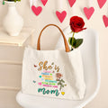 Personalizada Ella Es Fuerte Flor de Nacimiento Mariposas Bolsa de Lona Reutilizable con Apodo y Asa de Piel Regalo de Cumpleaños Día de la Madre para Mujer