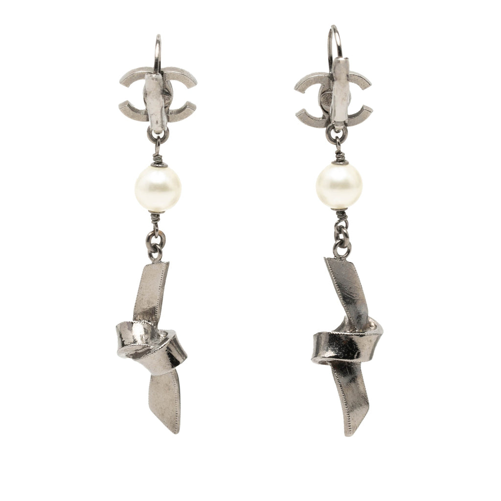 CC Brass Plated Faux Pearl Ribbon Knot Dangle Earrings