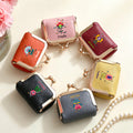 Personalizado Colorido Arte Popular Flor de cuero genuino portátil Mini joyero con Kiss Lock y el nombre de uso diario regalo de cumpleaños para las mujeres