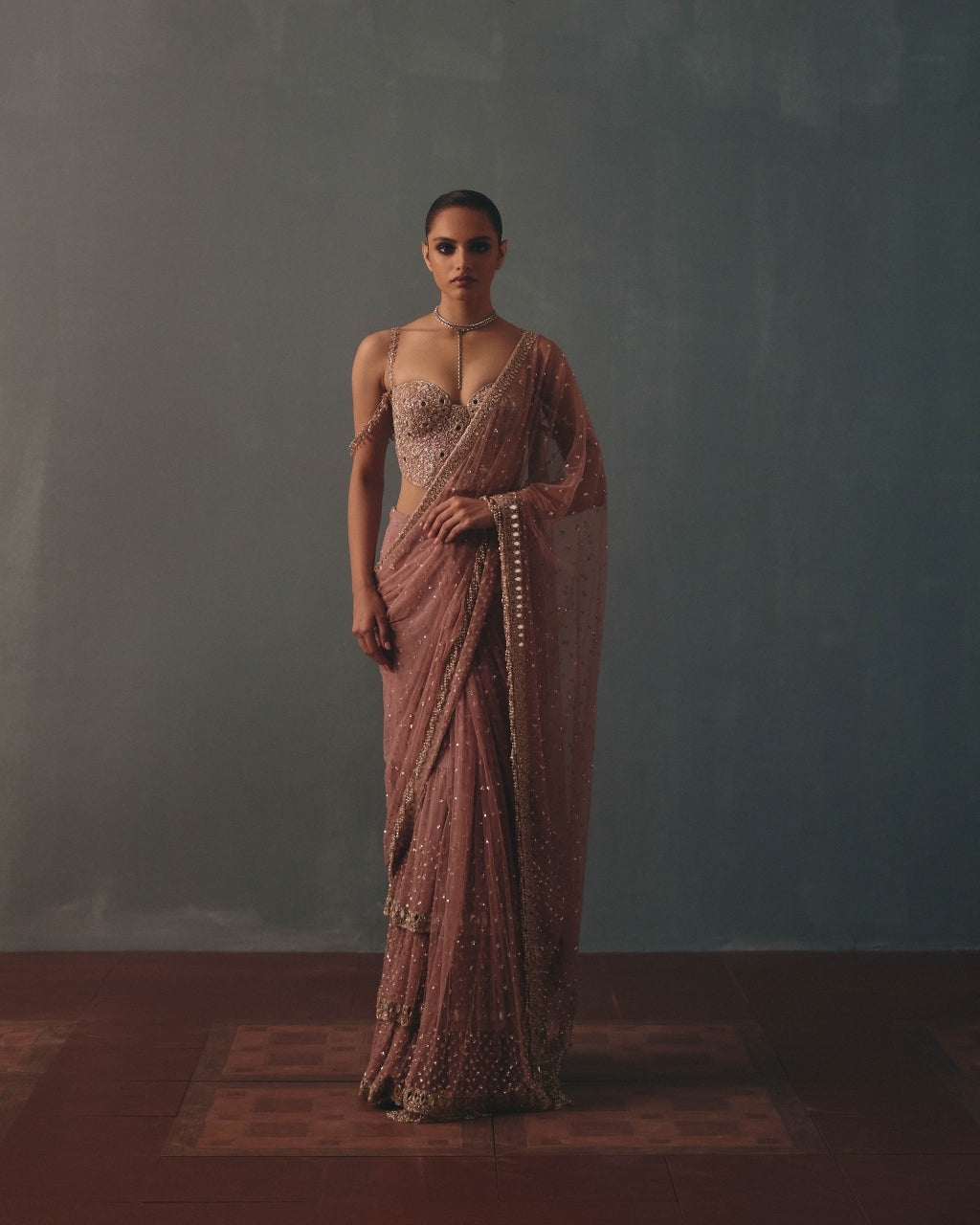 Mauve & Rose Gold Hand Embroidered Net & Mirror Corset & Net Ruffle Sari Set By KYNAH, Luxury Indian Fashion & Bridal Wear