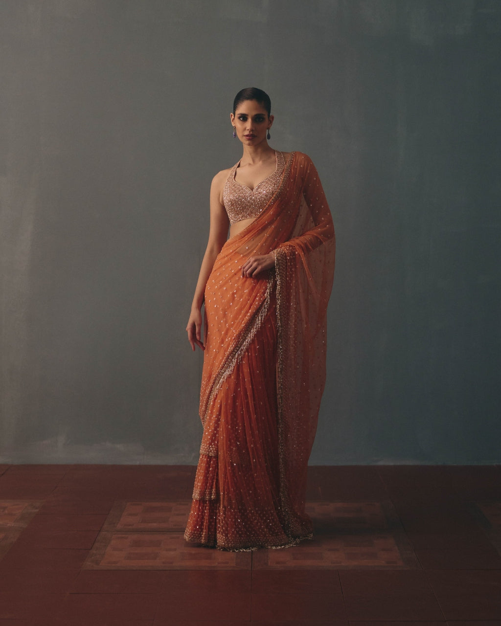 Peach Fuzz &  Rose Gold Hand Embroidered Net & Mirror Blouse & Net Ruffle Sari Set By KYNAH, Luxury Indian Fashion & Bridal Wear