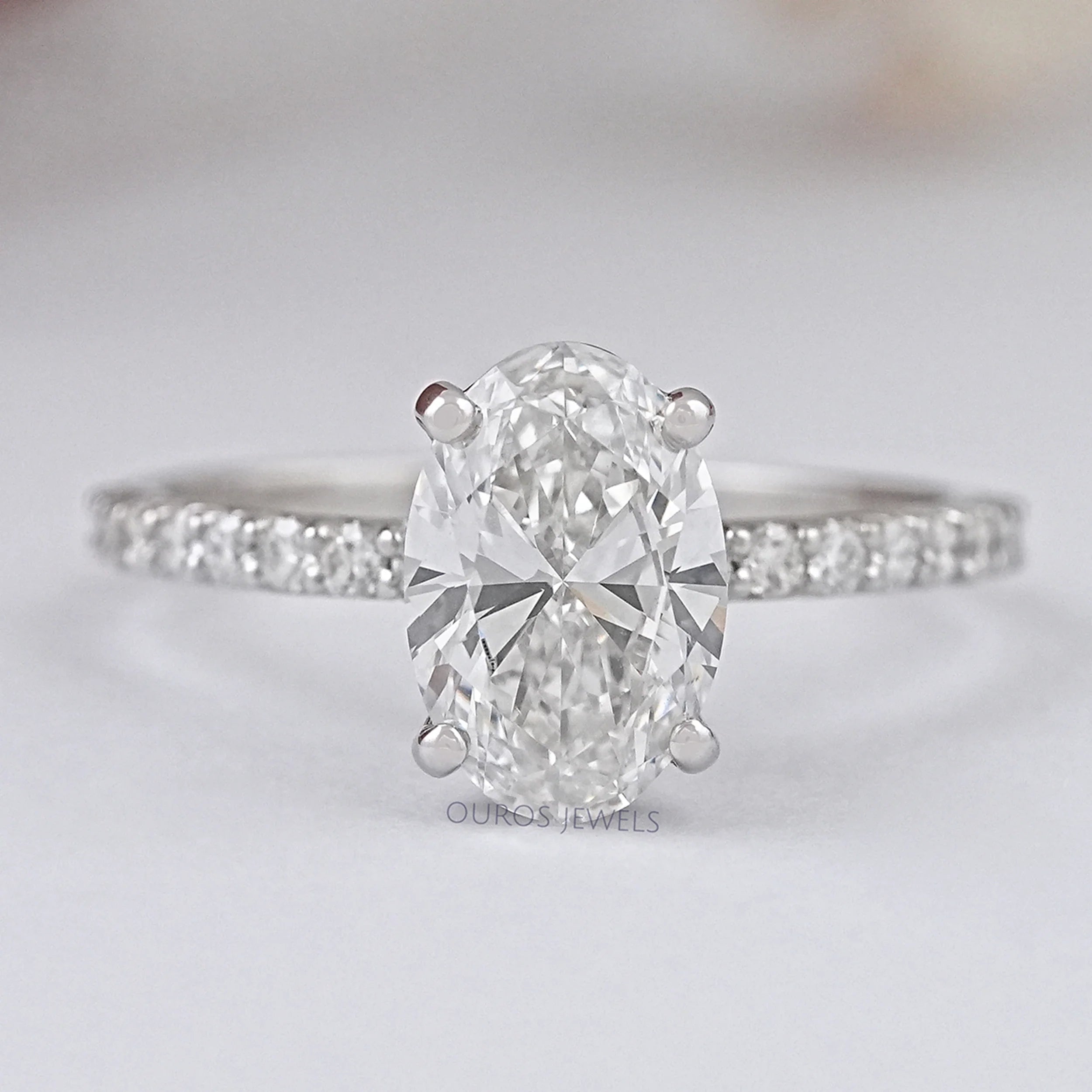 Oval Shape Solitaire With Accent Ring