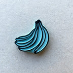 Banana rubber stamps, peeled banana and a banana bunch