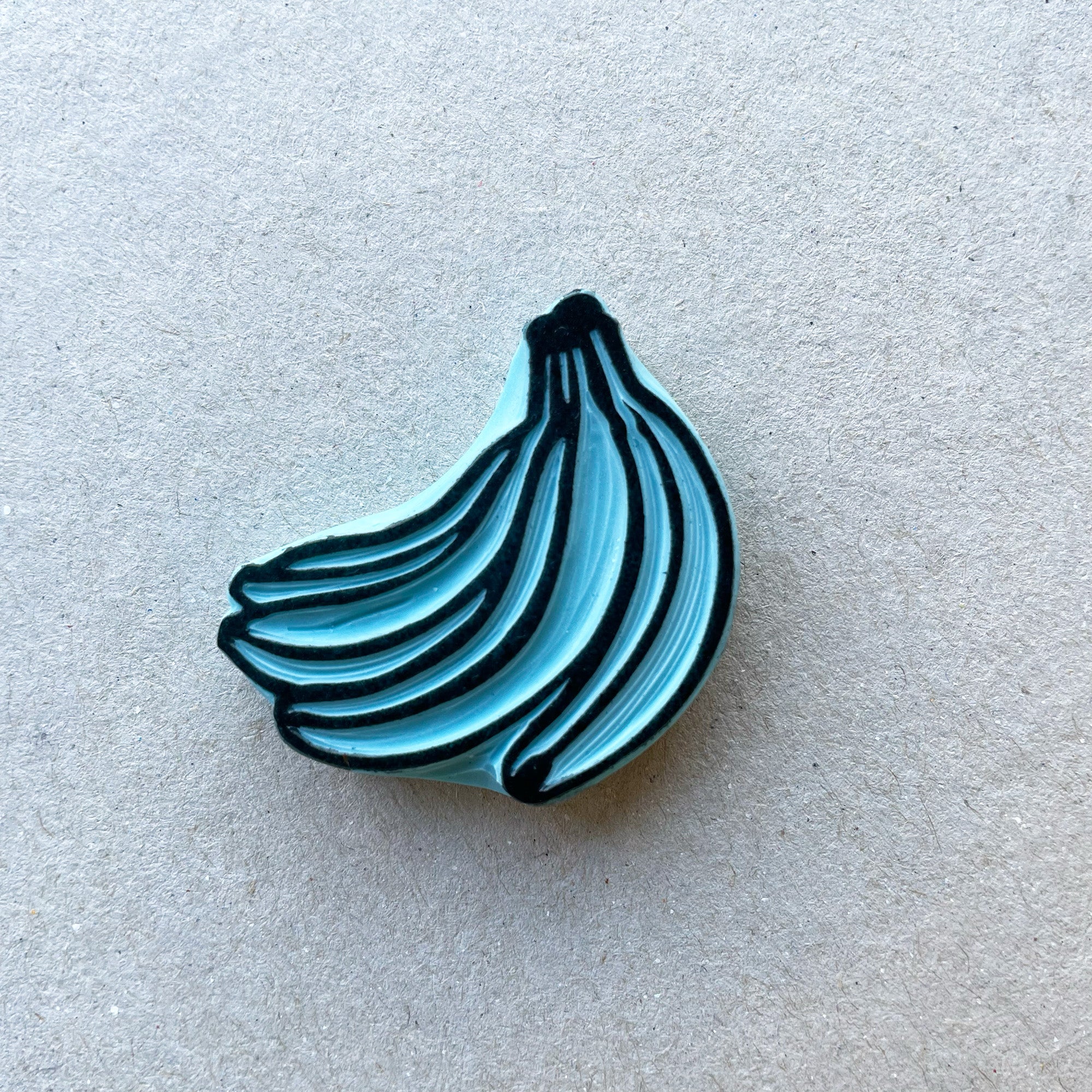 Banana rubber stamps, peeled banana and a banana bunch