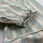 Babero con manga impermeable Vertical Stripes Nenina & Co
