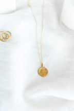 COLGANTE MONEDA IRREGULAR | BRONCE